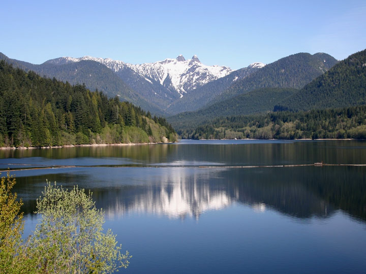 Lions Peaks reflection on Capilano Lake